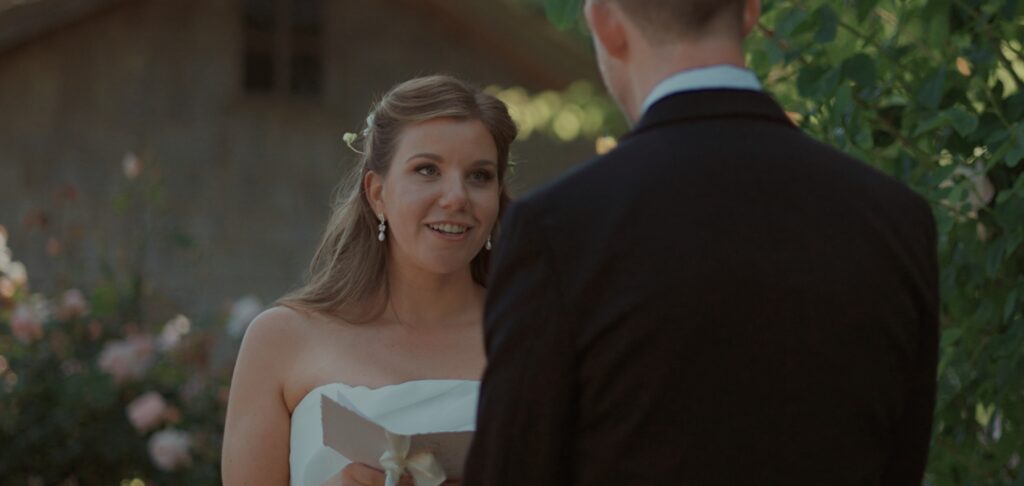 bride saying her vows during wedding ceremony
