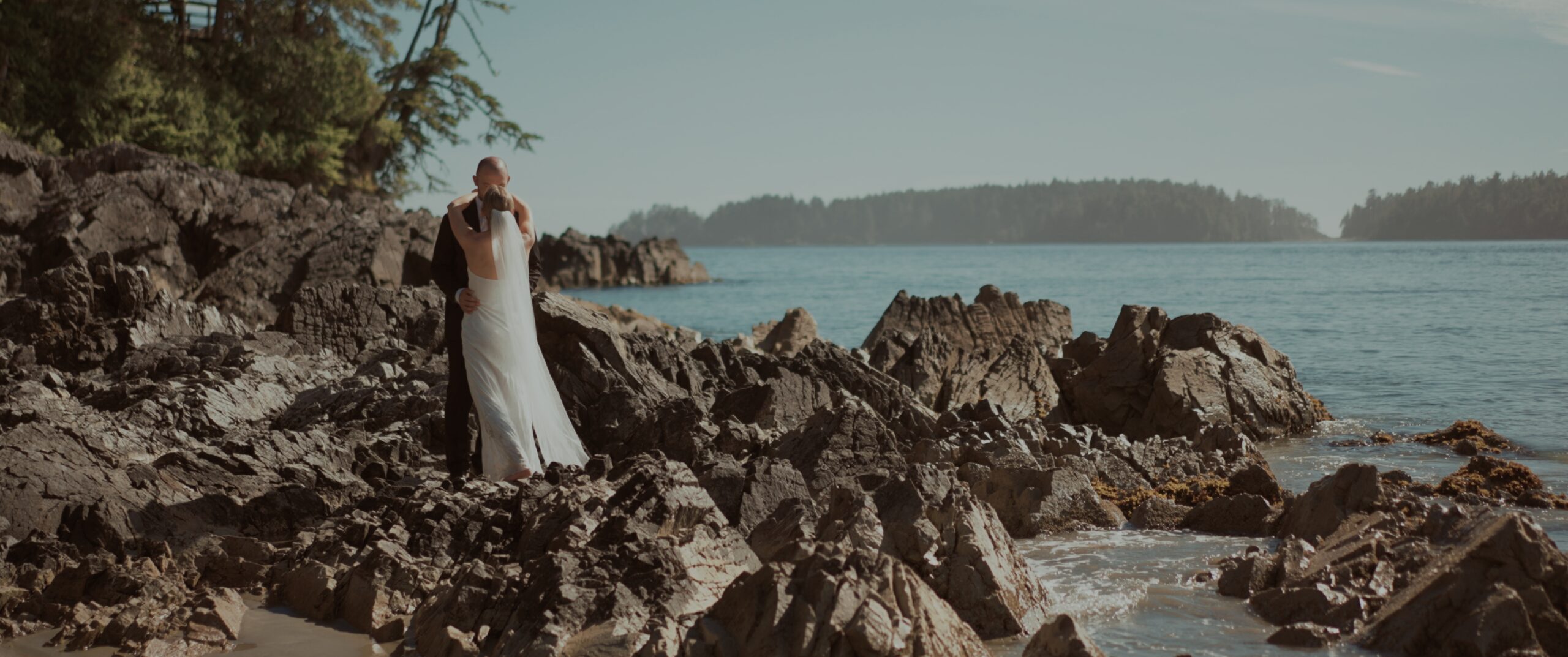 bride and groom at tonquin beach in tofino